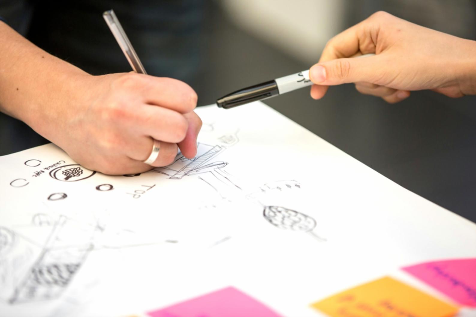 Investment education materials and financial planning resources arranged on a modern workspace